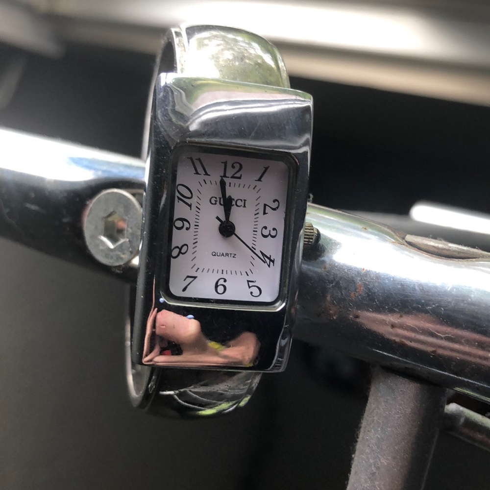 Vintage Gucci silver cartier style snap watch.